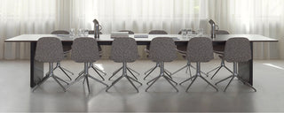 Modern designer chairs blending comfort, elegance, and sculptural style for indoor and outdoor use.